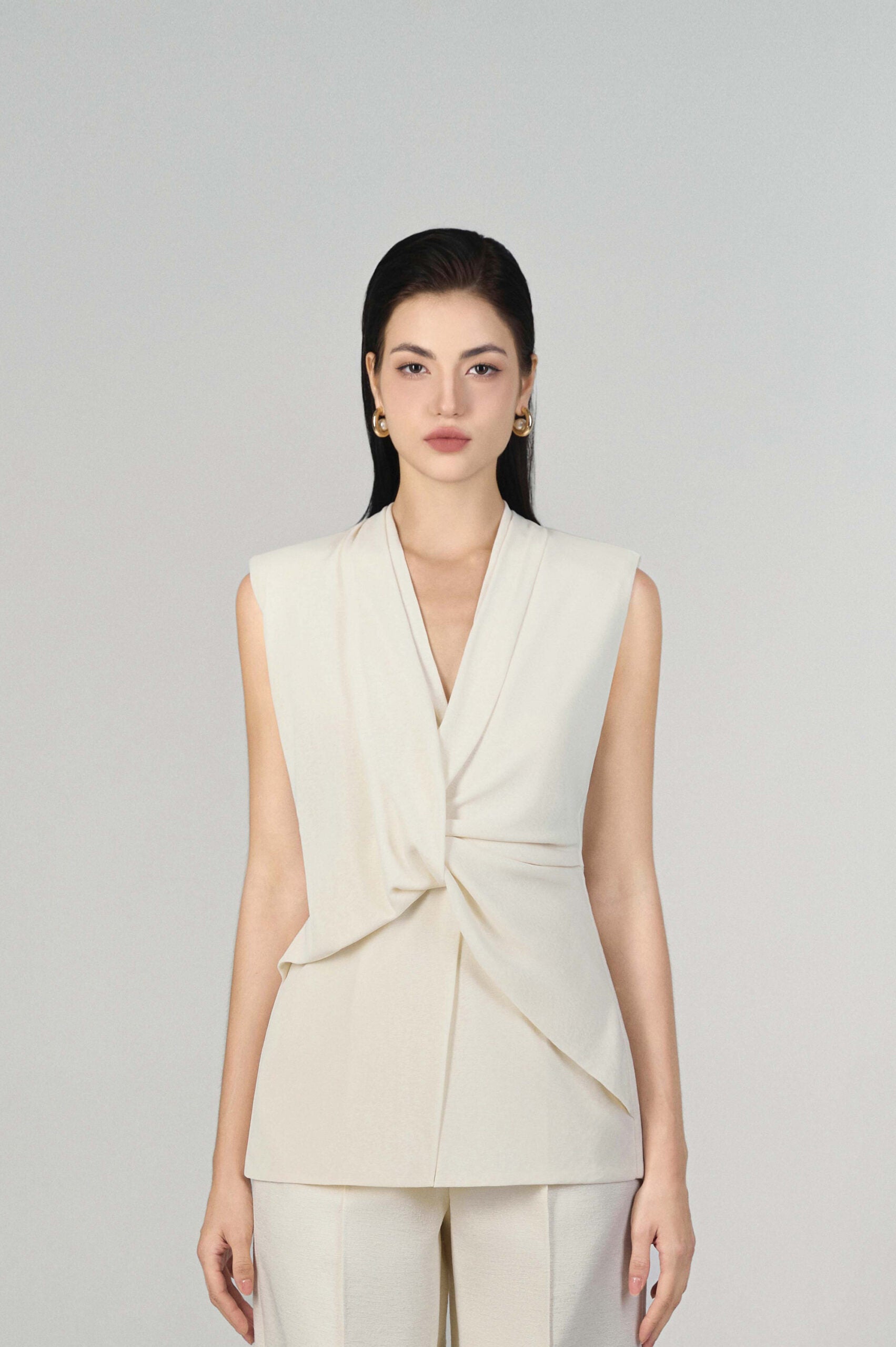 Harper Sleeveless Peplum Top