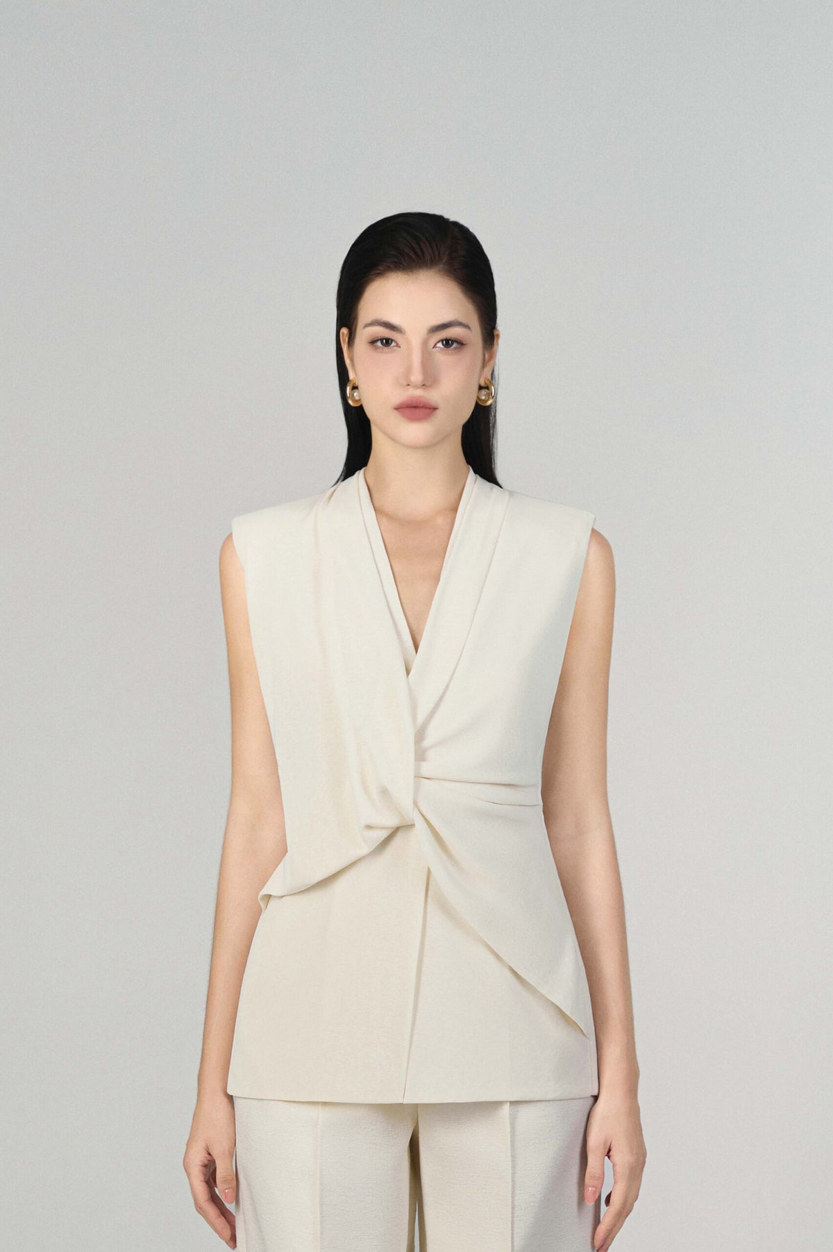 Harper Sleeveless Peplum Top